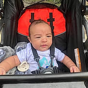 Harlem joined the competition — help win amazing prizes! accessories, architecture, baby, buggy, building, clothing, face, furniture, head, outdoors, person, photography, portrait, shelter, sleeping, stroller, sunglasses, t_shirt, transportation, vehicle