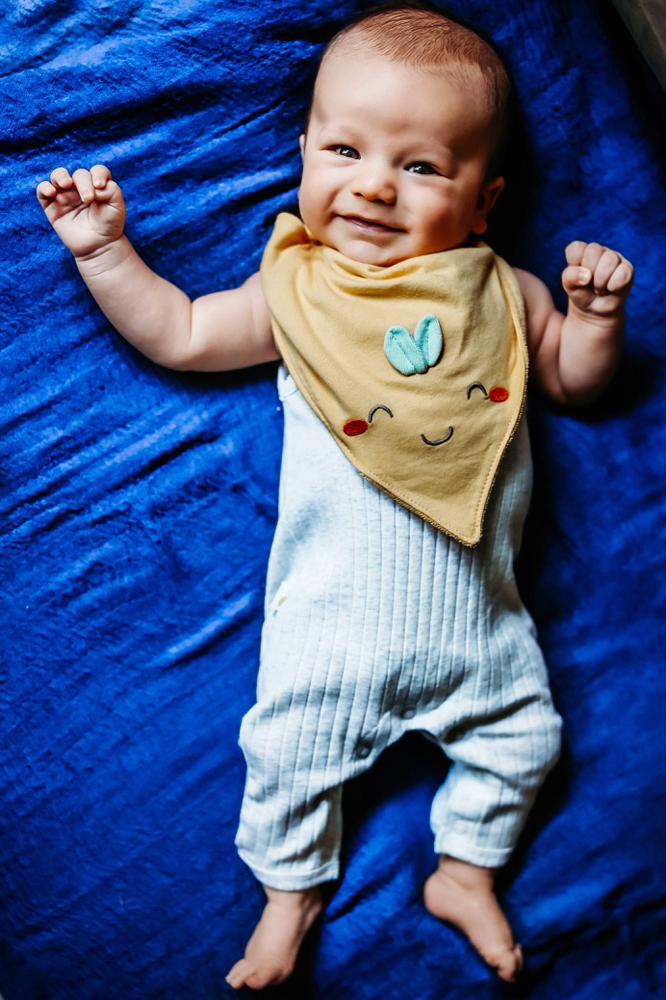 Ivan is registered to the contest to win money with this photo: azure, baby, baby_toddler_clothing, blue, cheek, child, electric_blue, eye, face, flash_photography, fun, gesture, happy, head, person, skin, sleeve, smile, standing, textile