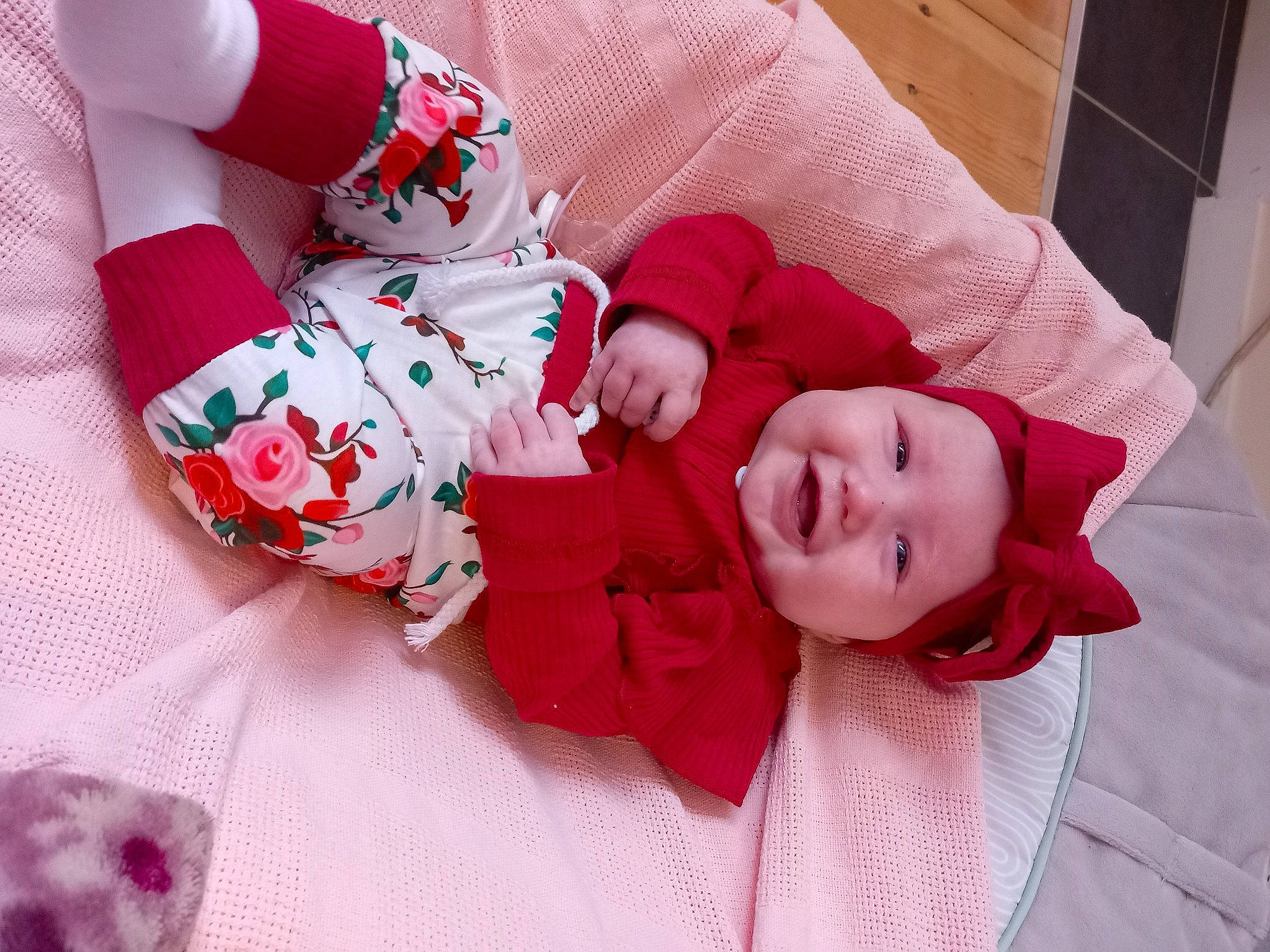 Sapphire joined the competition — help win amazing prizes! baby, baby_products, baby_toddler_clothing, carmine, child, comfort, face, happy, headwear, joy, linens, magenta, pattern, person, pink, room, skin, sleeve, smile, sock