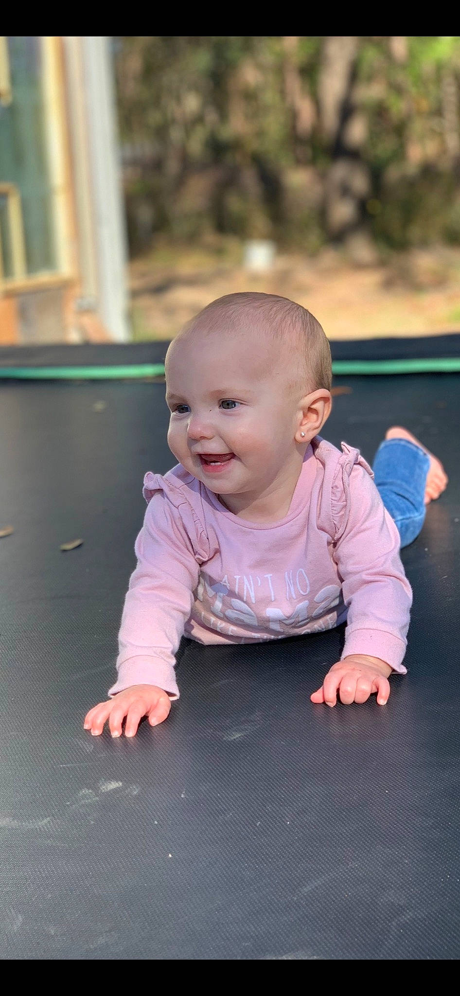 Ashton is registered to the contest to win money with this photo: baby_toddler_clothing, cheek, child, crawling, ear, eye, facial_expression, finger, hand, happy, human_body, joy, lip, mouth, nose, organ, person, pink, sitting, skin