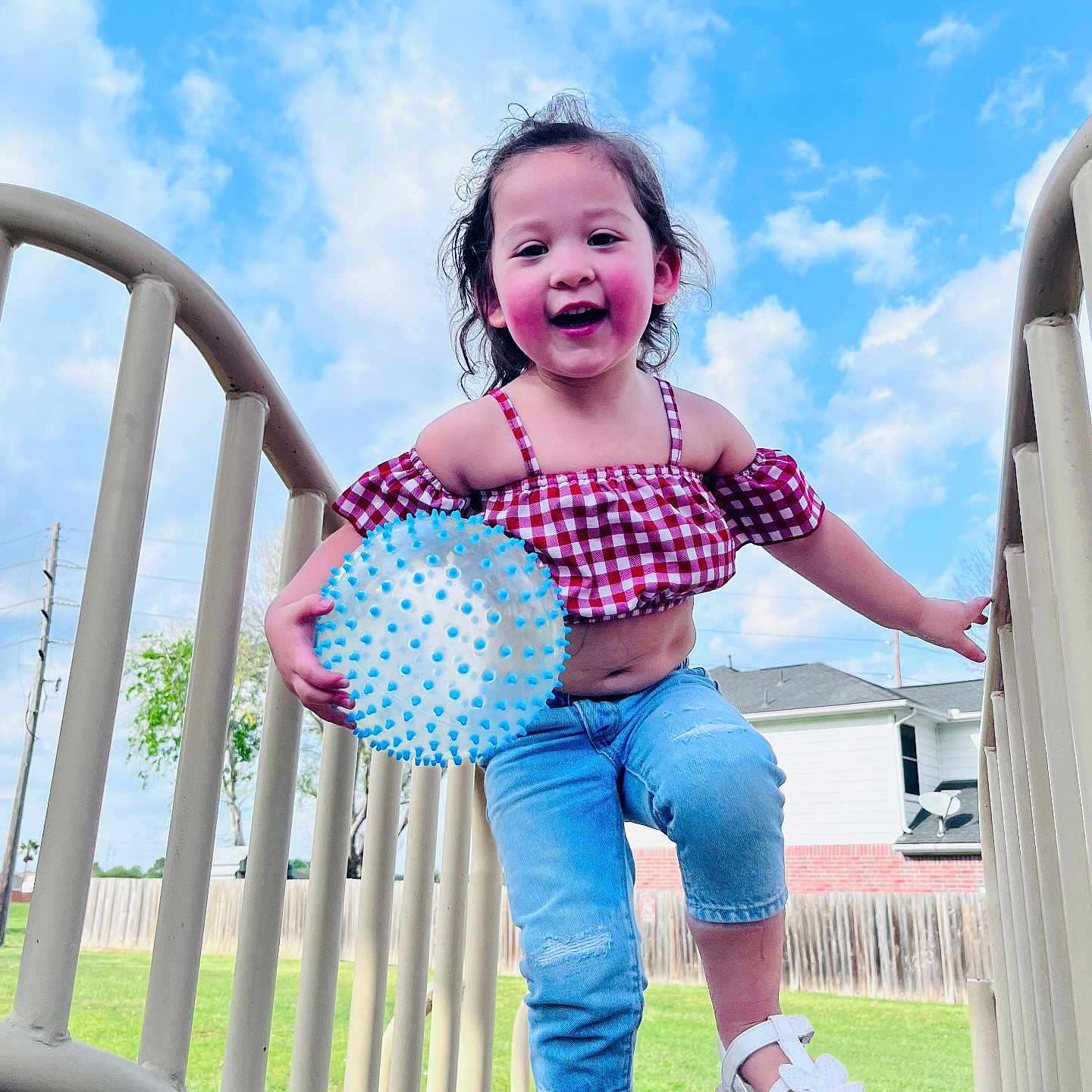 Lahlani is registered to the contest to win money with this photo: child, clothing, face, female, footwear, girl, grass, head, jeans, nature, outdoors, pants, park, person, photography, plant, portrait, sandal, shoe, summer