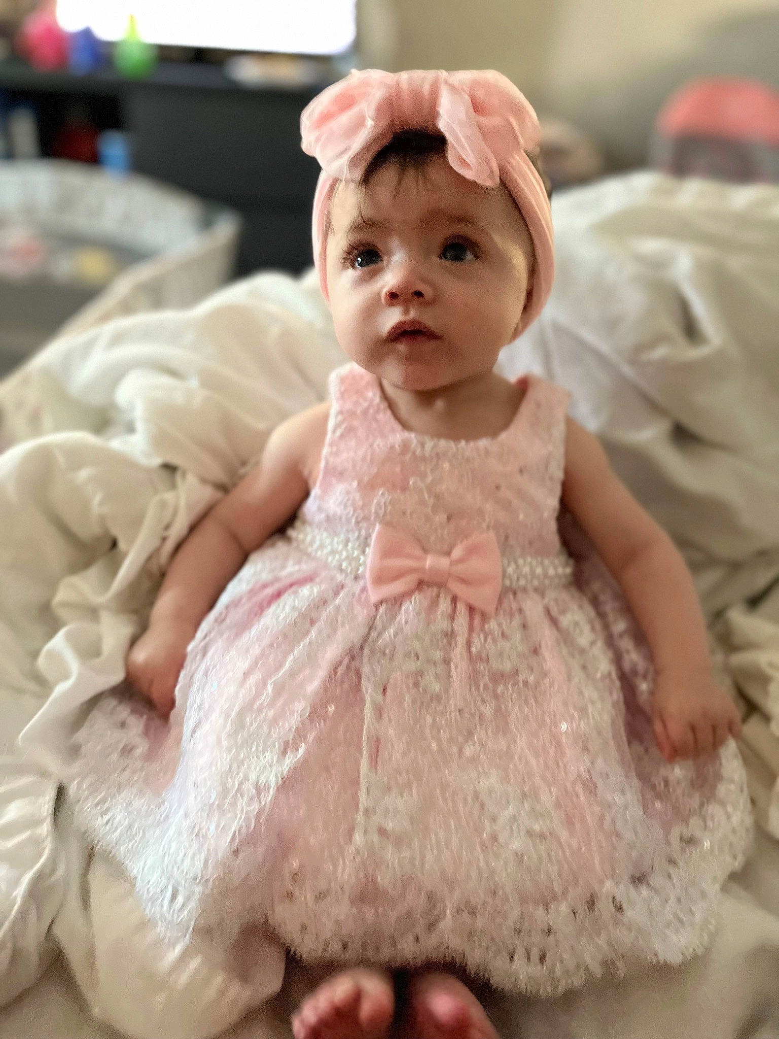 Brinley joined the competition — help win amazing prizes! baby, baby_toddler_clothing, cheek, child, day_dress, dress, embellishment, happy, headwear, iris, one_piece_garment, pattern, peach, person, pink, product, ruffle, sitting, skin, sleeve