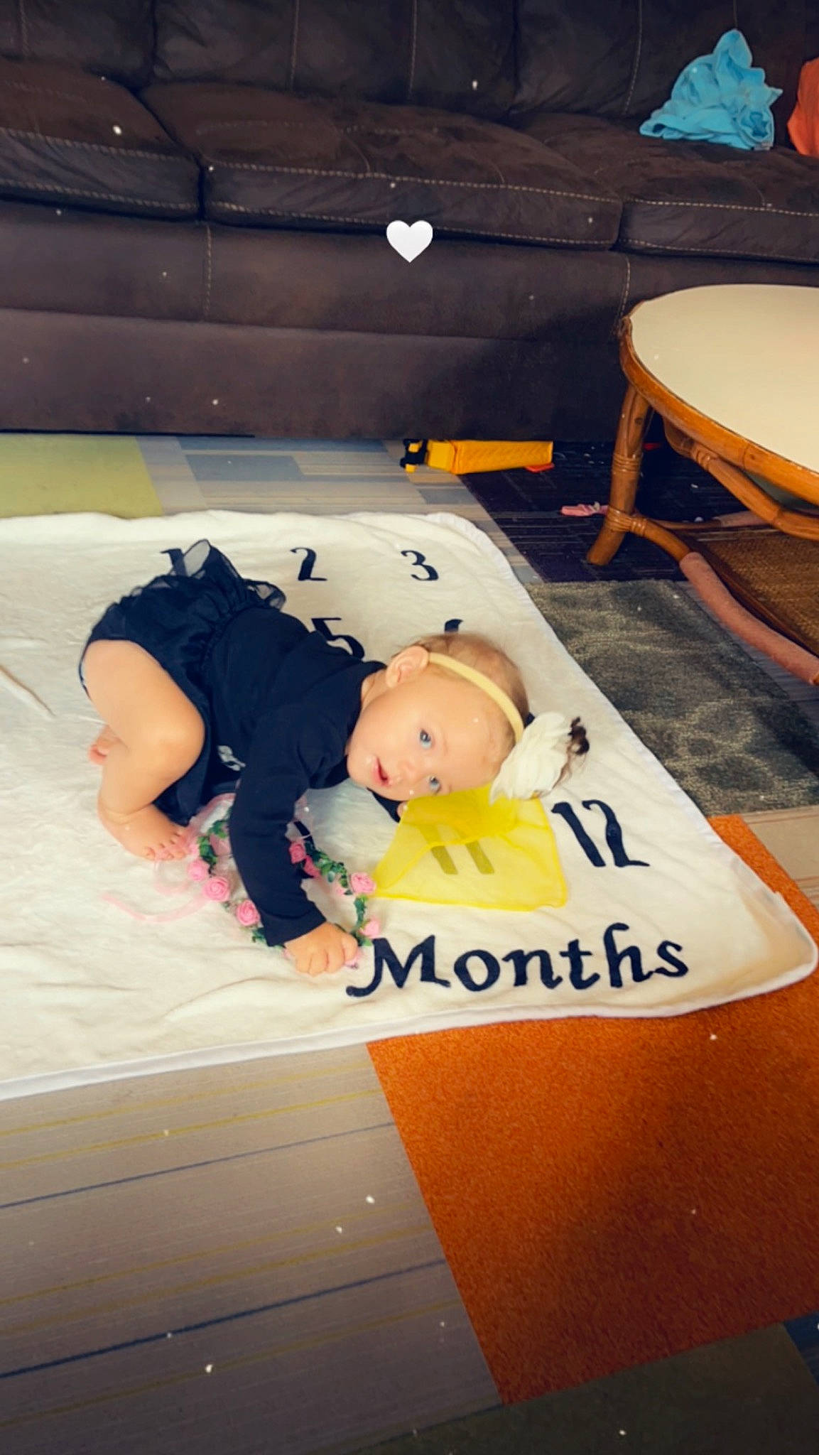 Brinley is registered to the contest to win money with this photo: baby, baby_products, baby_safety, baby_toddler_clothing, child, comfort, flooring, fun, knee, lap, leisure, person, room, sitting, thigh, toddler