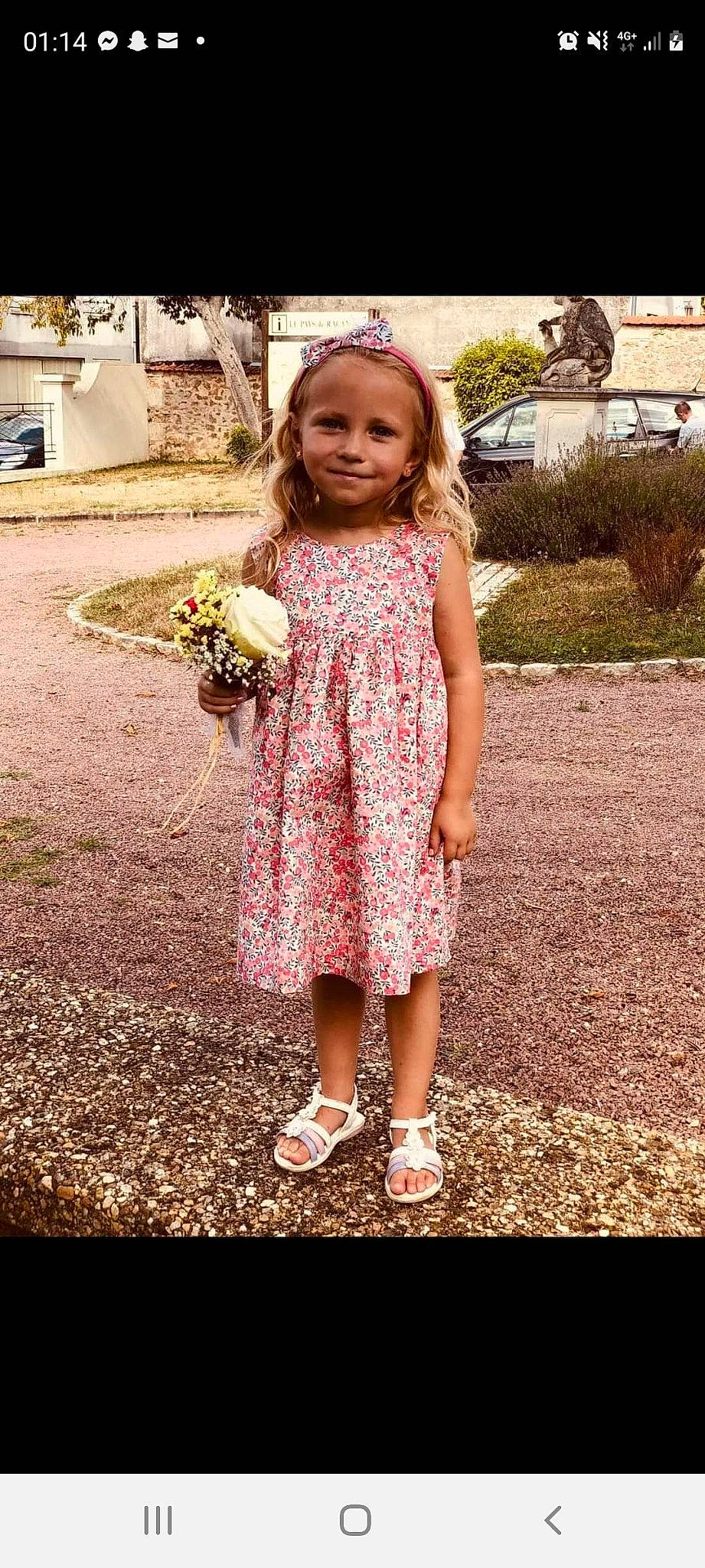 Kélya a rejoint le concours — aidez-le/la à gagner de superbes lots ! clothing, day_dress, dress, flower, footwear, formal_wear, grass, hair, happy, head, joy, one_piece_garment, pattern, people, people_in_nature, person, pink, plant, sandal, toddler