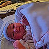 Amara is registered to the contest to win money with this photo: newborn, baby, blanket, hat, infant, bed, person, face, clothing, indoors, resting, couch, fabric, cozy, soft, wrapped, portrait, sleepwear, human, cute