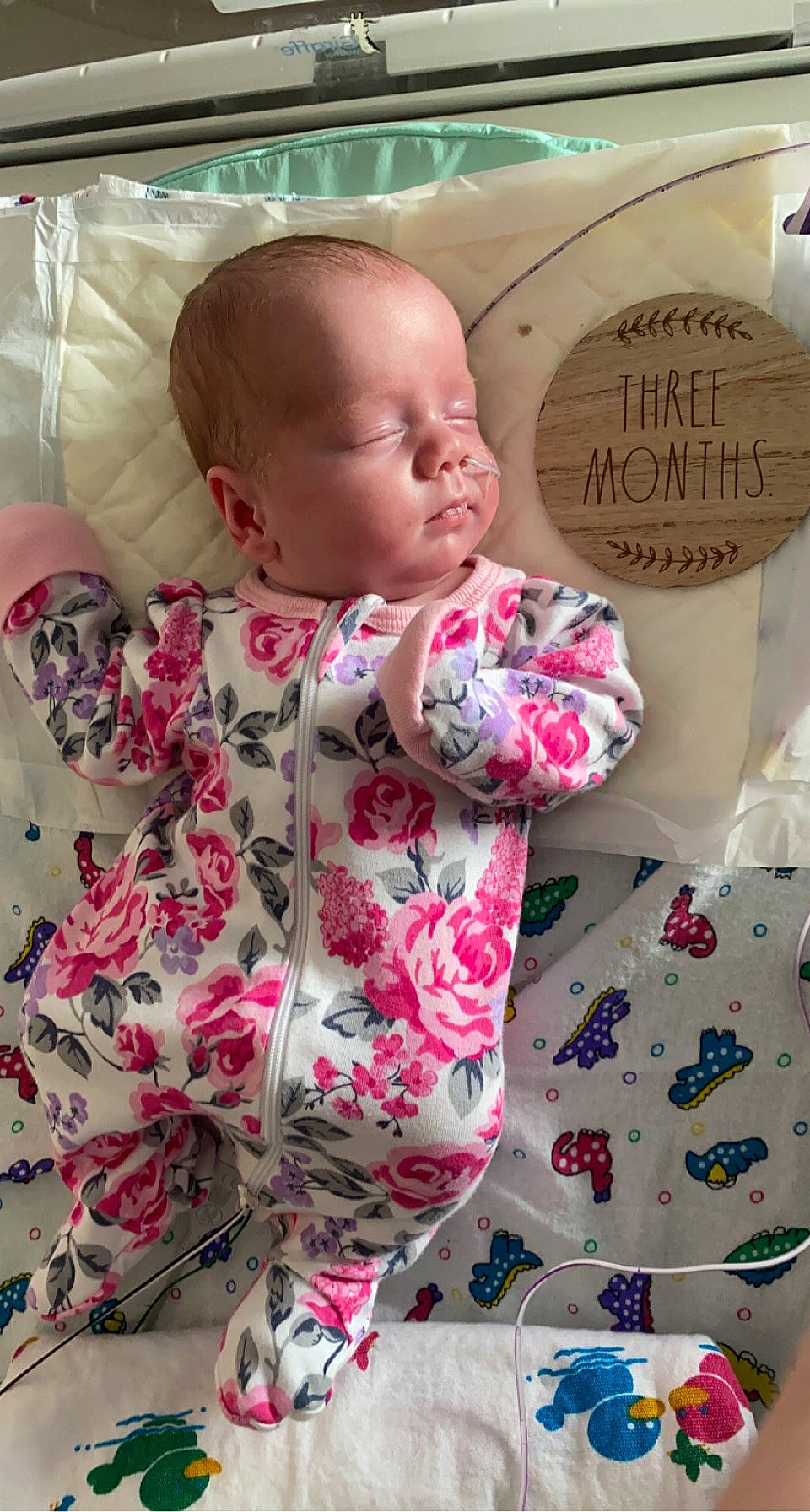 Scarlett joined the competition — help win amazing prizes! baby, baby_toddler_clothing, bed, bedding, child, comfort, facial_expression, hairstyle, happy, human, linens, mammal, person, pink, product, shirt, skin, sleeve, t_shirt, textile