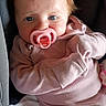 Eden joined the competition — help win amazing prizes! baby, infant, pacifier, pink_clothing, car_seat, red_hair, blue_eyes, child, cute, newborn, portrait, indoors, soft_lighting, sitting, human, face, small_hands, cozy, blanket, closeup