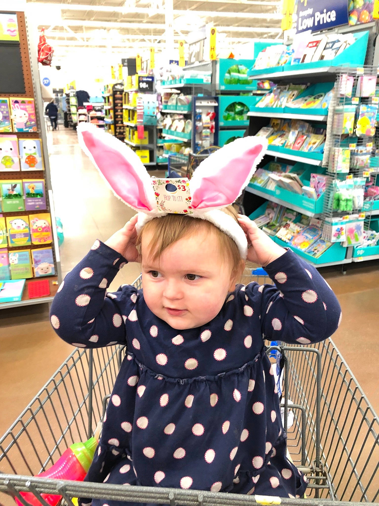 Alaska is registered to the contest to win money with this photo: child, ear, organ, pattern, person, polka_dot, smile, supermarket, toddler