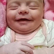 Lakelynn joined the competition — help win amazing prizes! baby, infant, smile, blanket, pink, hands, sleepy, cute, child, face, skin, newborn, clothing, soft, portrait, closeup, happy, wrapping, warm, cozy