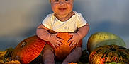 Penelope joined the competition — help win amazing prizes! baby, pumpkin, autumn_leaves, fall, orange, yellow, headband, smiling, sitting, cute, child, seasonal, harvest, decor, holiday, portrait, indoor, cozy, festive, cute_baby