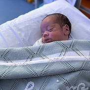 Cairo joined the competition — help win amazing prizes! newborn, baby, sleeping, blanket, knitted, hospital, bed, infant, peaceful, resting, swaddled, soft, portrait, head, face, indoors, comfort, quiet, young, person
