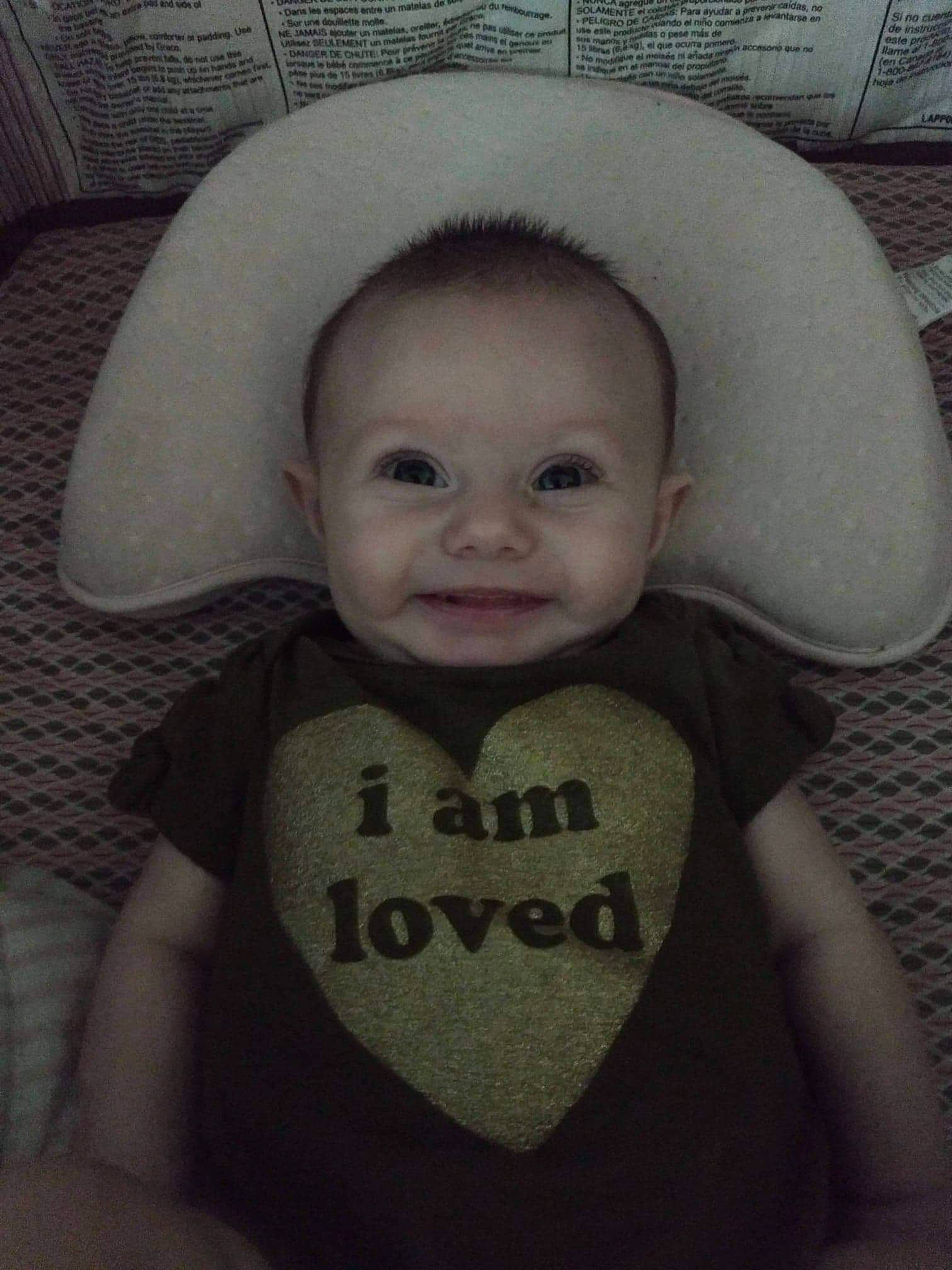 Evalynn is registered to the contest to win money with this photo: baby, baby_toddler_clothing, cheek, chin, comfort, eye, eyebrow, face, forehead, hair, happy, hat, headgear, iris, joy, lip, mouth, nose, person, skin