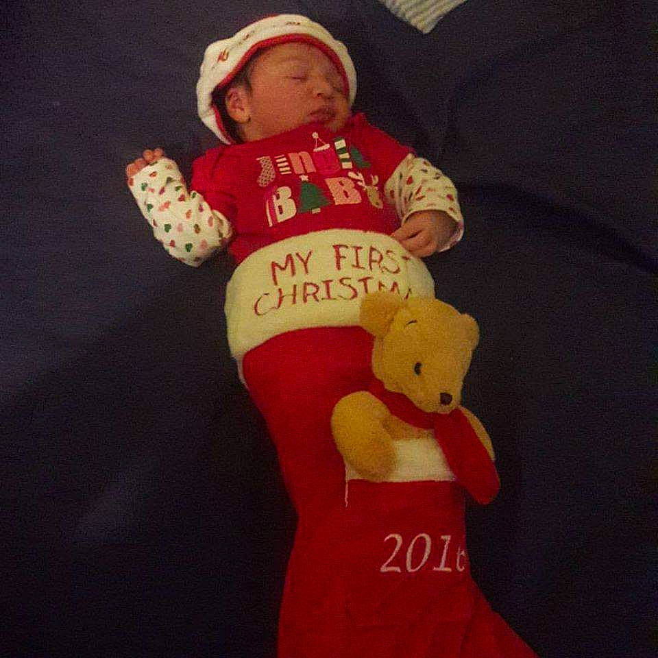 Nevaeh joined the competition — help win amazing prizes! child, christmas, christmas_stocking, fictional_character, headwear, person, red, sleeve, t_shirt