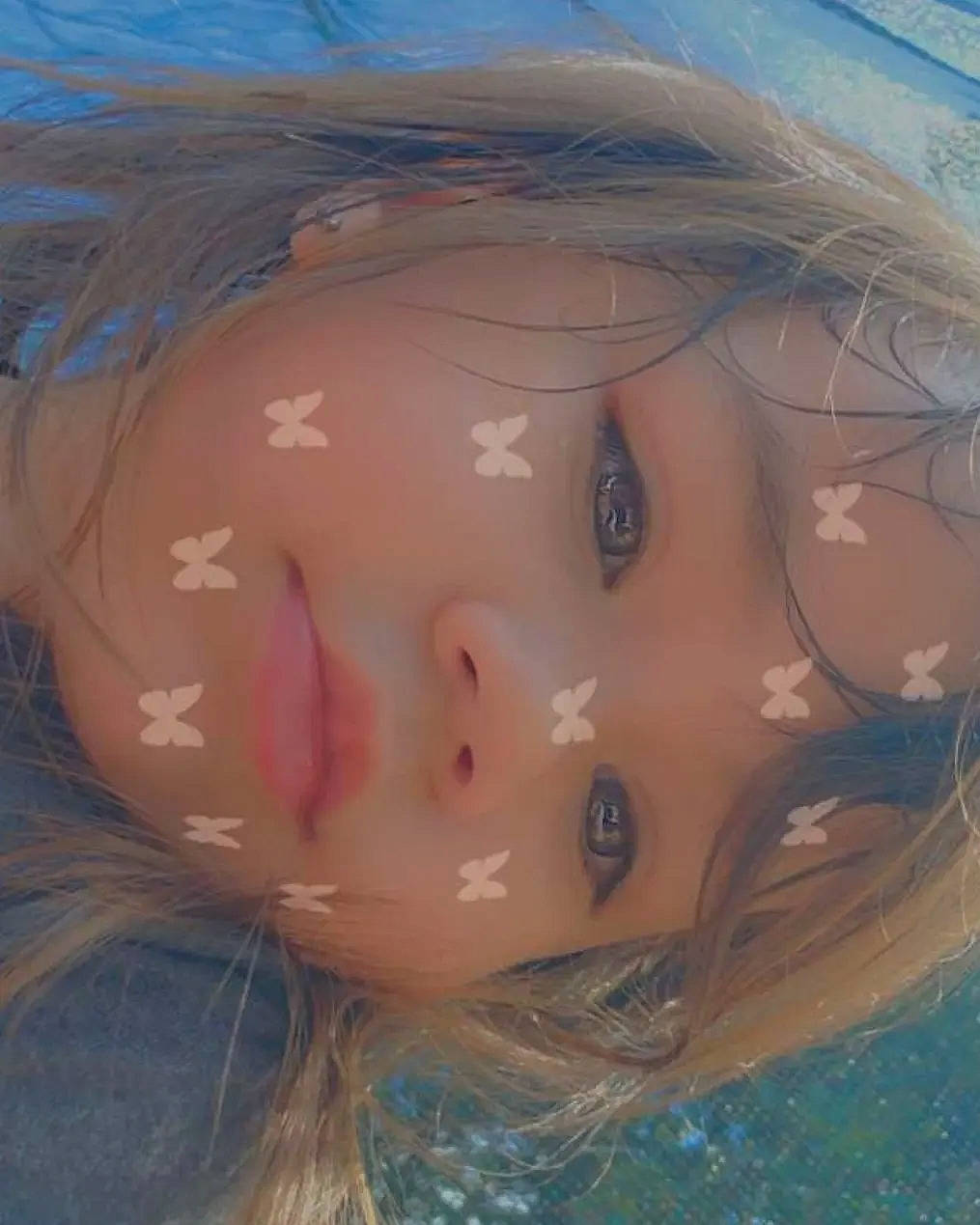 Whitney is registered to the contest to win money with this photo: art, bathing, brown_hair, chest, eyebrow, eyelash, fashion_accessory, fawn, fun, grass, hair_coloring, happy, iris, jaw, lip, long_hair, mouth, paint, person, visual_arts