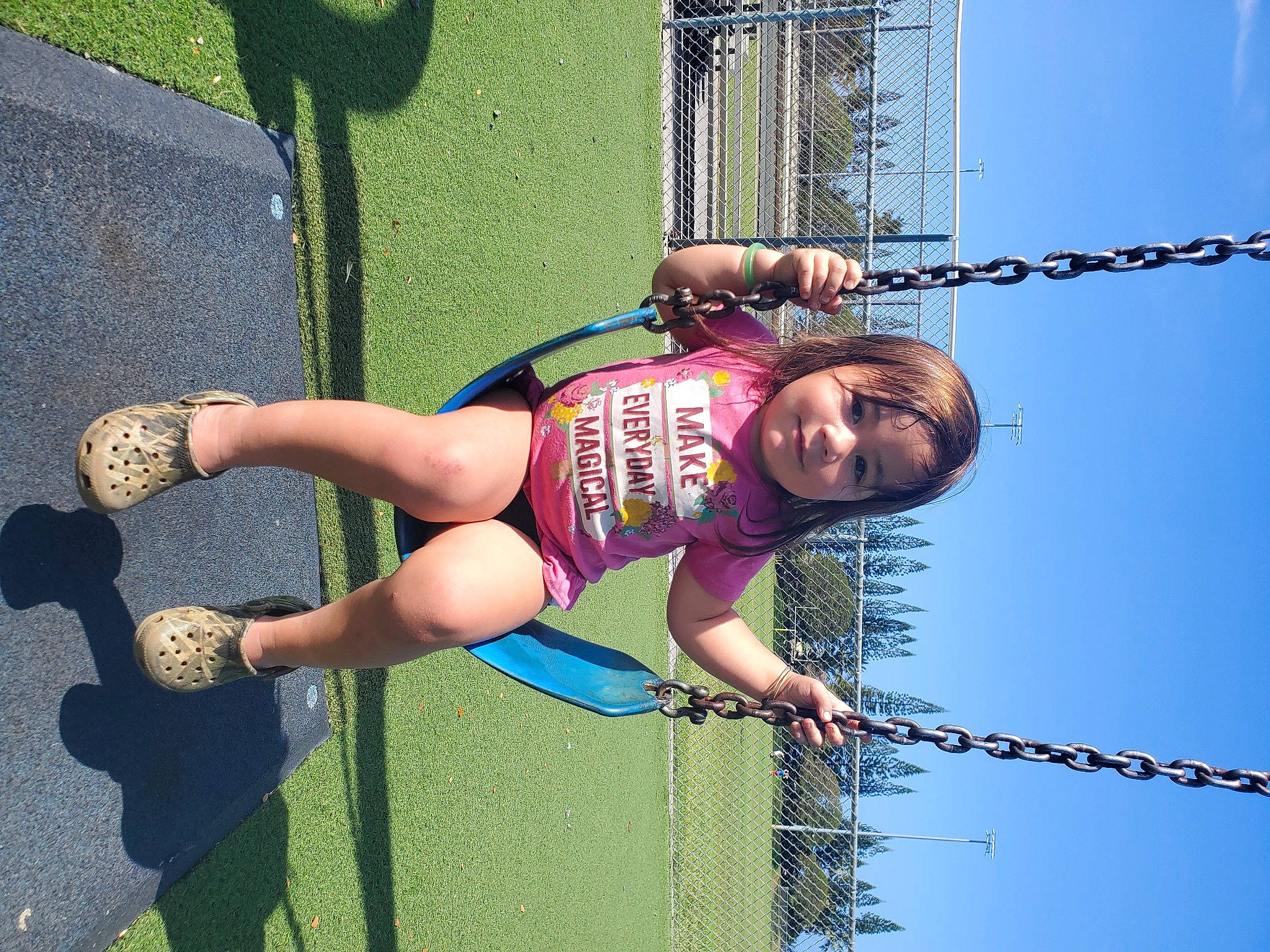 Whitney is registered to the contest to win money with this photo: arm, ball, electric_blue, exercise, fun, grass, hula_hoop, human_leg, knee, leisure, person, physical_fitness, recreation, rope, shorts, sky, smile, sports, sports_uniform, sportswear