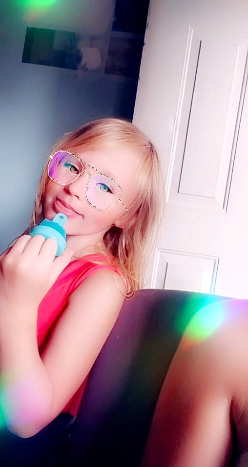 Samantha joined the competition — help win amazing prizes! beauty, blond, brown_hair, cheek, child, eyelash, face, finger, fun, hair, hand, lip, long_hair, mouth, neck, nose, person, photography, pink, selfie