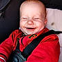 Harrison is registered to the contest to win money with this photo: baby, child, smiling, red_jacket, car_seat, harness, happy, face, messy, infant, seatbelt, cute, young_child, portrait, closeup, clothing, sitting, indoor, baby_boy, joyful