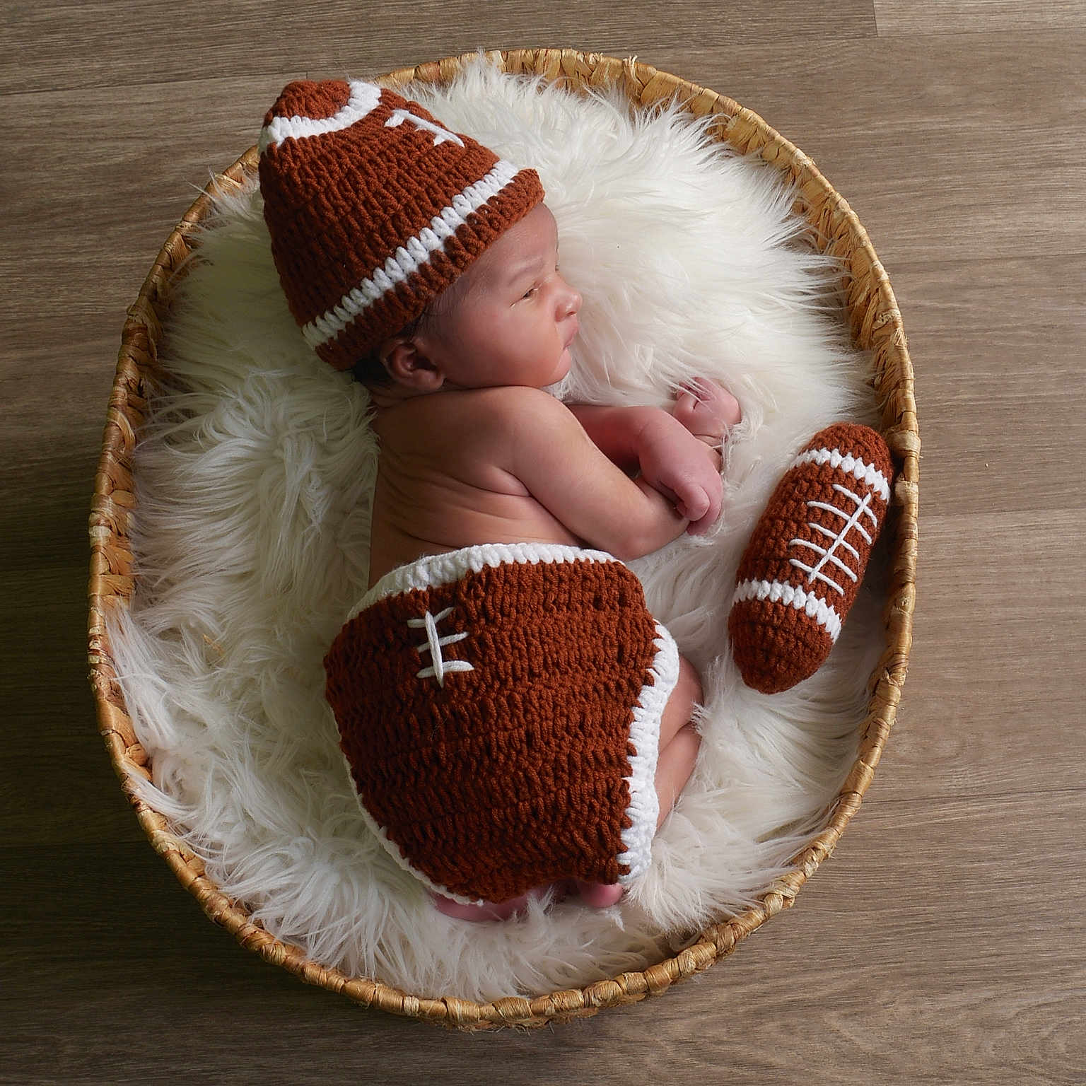 Kwamane joined the competition — help win amazing prizes! baby, basket, beanie, bed, bonnet, cap, clothing, cradle, crib, face, furniture, hardwood, hat, head, infantbed, newborn, person, photography, portrait, wood