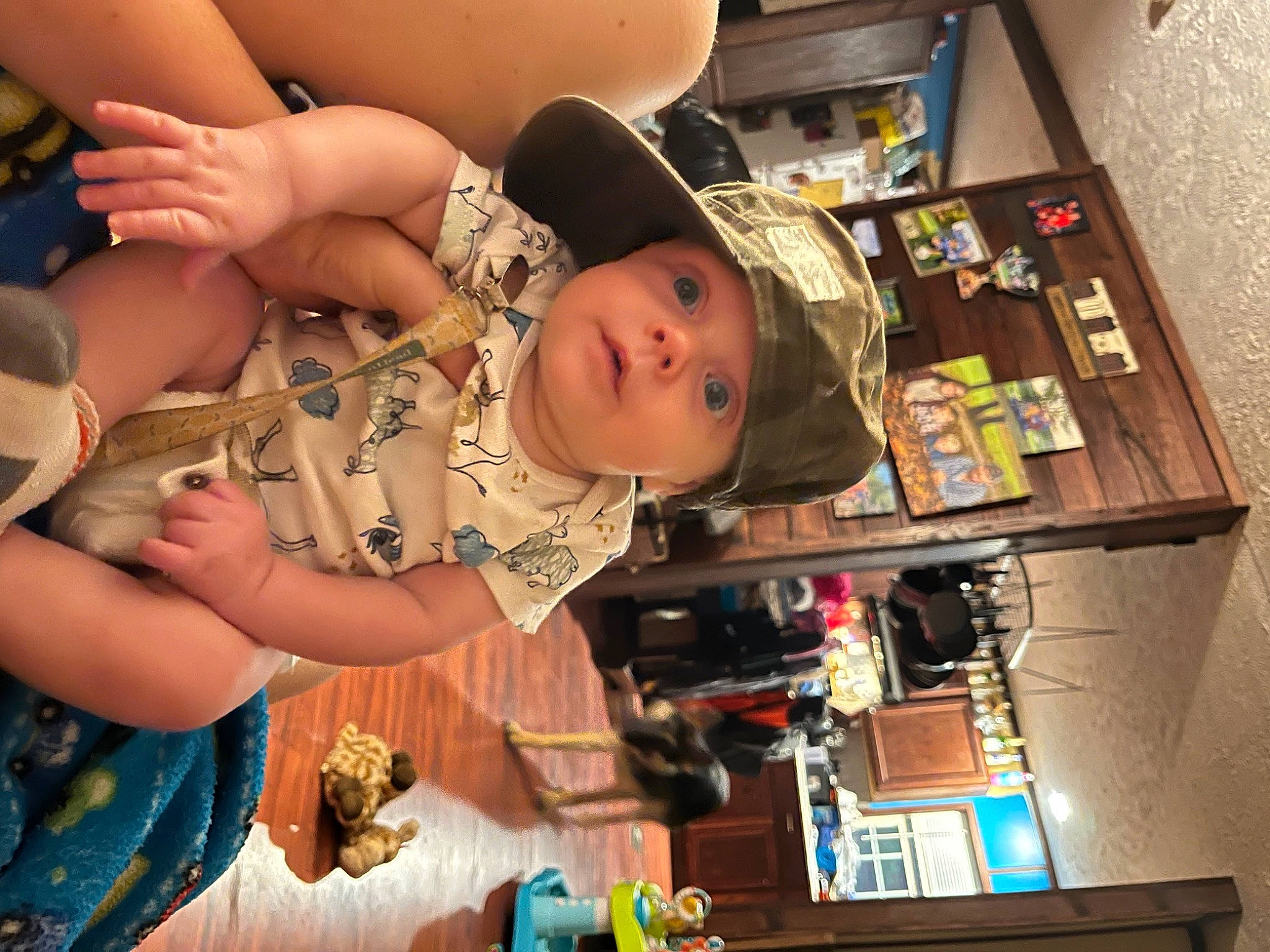 Kendrix is registered to the contest to win money with this photo: baby, baby_products, baby_toddler_clothing, box, child, comfort, event, fun, hat, headwear, pattern, person, personal_protective_equipment, play, room, thumb, toddler
