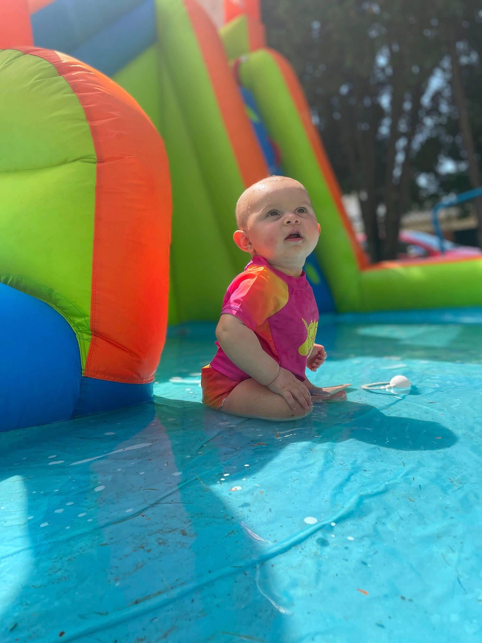 Jacie joined the competition — help win amazing prizes! aqua, baby, blue, bounce_house, child, chute, fun, games, grass, happy, inflatable, leisure, outdoor_play_equipment, person, play, playground, playground_slide, recreation, swimming_pool, toddler