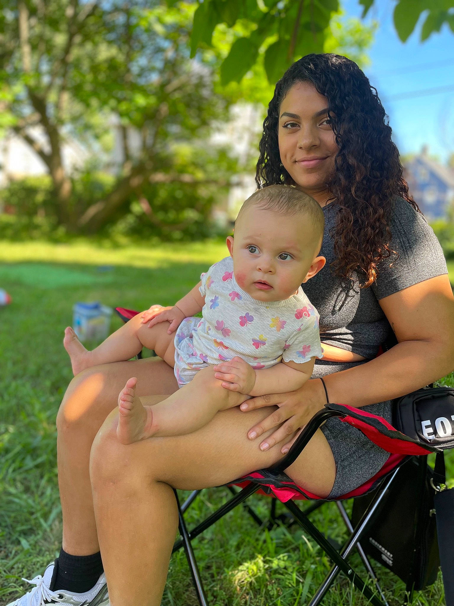 Jacie joined the competition — help win amazing prizes! baby, child, fun, grass, happy, human_leg, joy, lap, leaf, leg, leisure, people_in_nature, person, plant, recreation, shorts, skin, summer, thigh, toddler