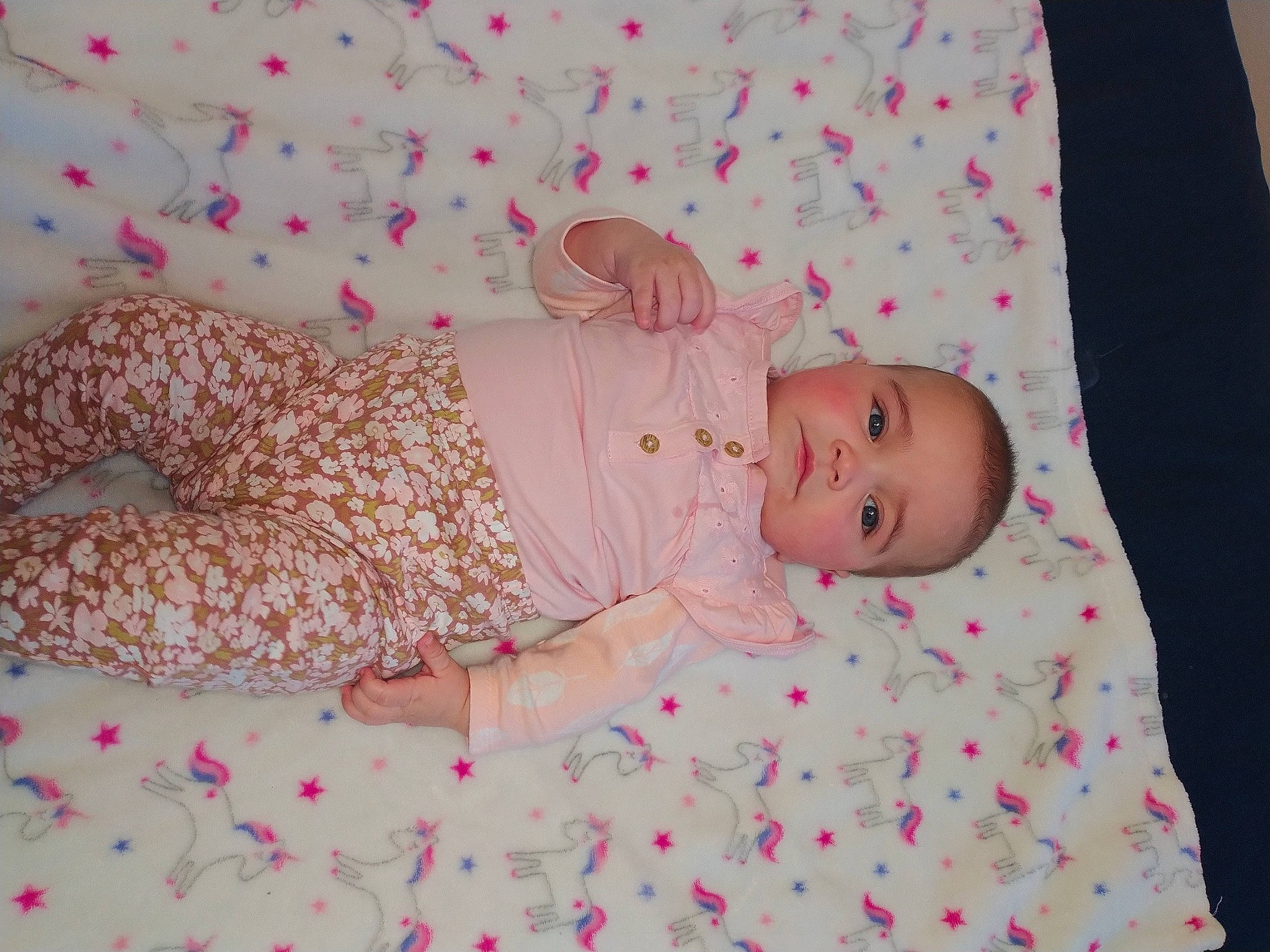 Anahi joined the competition — help win amazing prizes! arm, baby, baby_products, baby_sleeping, baby_toddler_clothing, child, comfort, face, hand, head, linens, magenta, mammal, pattern, person, pink, room, skin, sleeve, textile