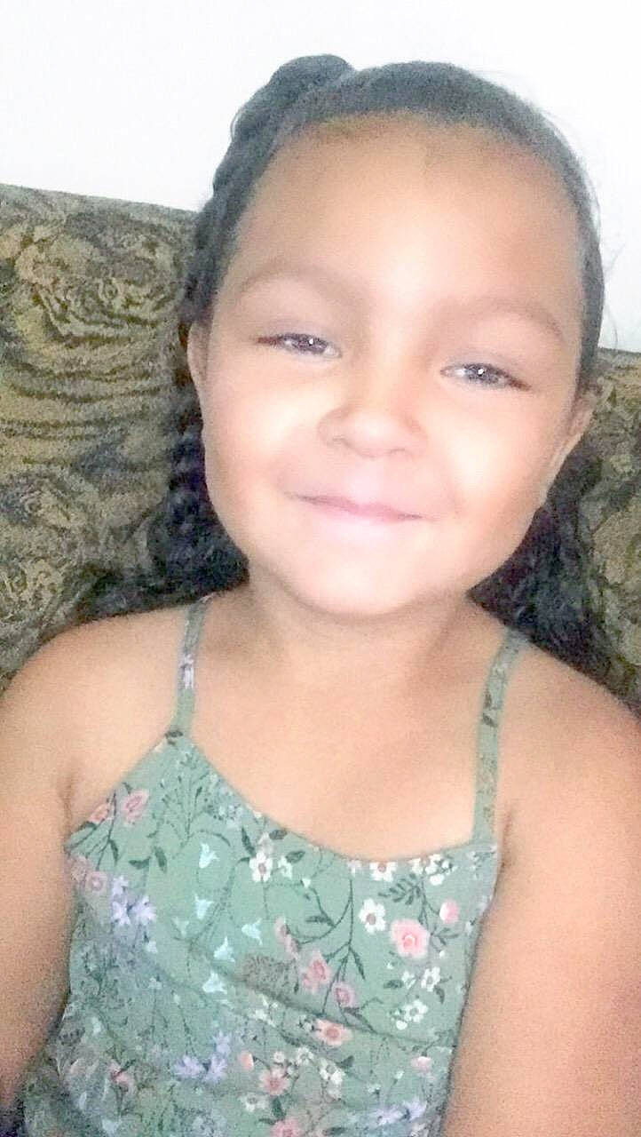 Leilanni is registered to the contest to win money with this photo: black_hair, brown_hair, cheek, child, child_model, chin, eye, eyebrow, face, forehead, girl, hair, hairstyle, head, human_hair_color, iris, joy, long_hair, nose, person