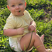 Prometheus is registered to the contest to win money with this photo: baby, child, grass, outdoor, nature, sunlight, diaper, yellow_shirt, greenery, curious, chewing, sitting, cute, infant, summer, playful, barefoot, field, toddler, portrait