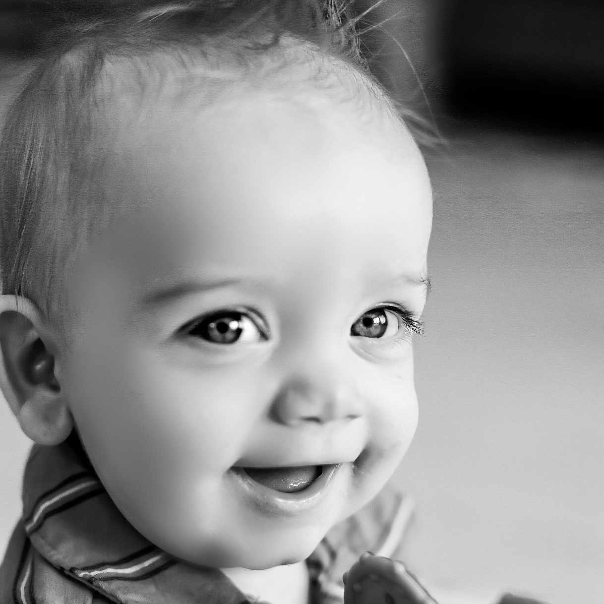 Braxton is registered to the contest to win money with this photo: baby, babylaughing, bodypart, clothing, coat, ear, face, finger, hand, happy, head, jacket, laughing, mouth, newborn, person, photography, portrait, smile, teeth