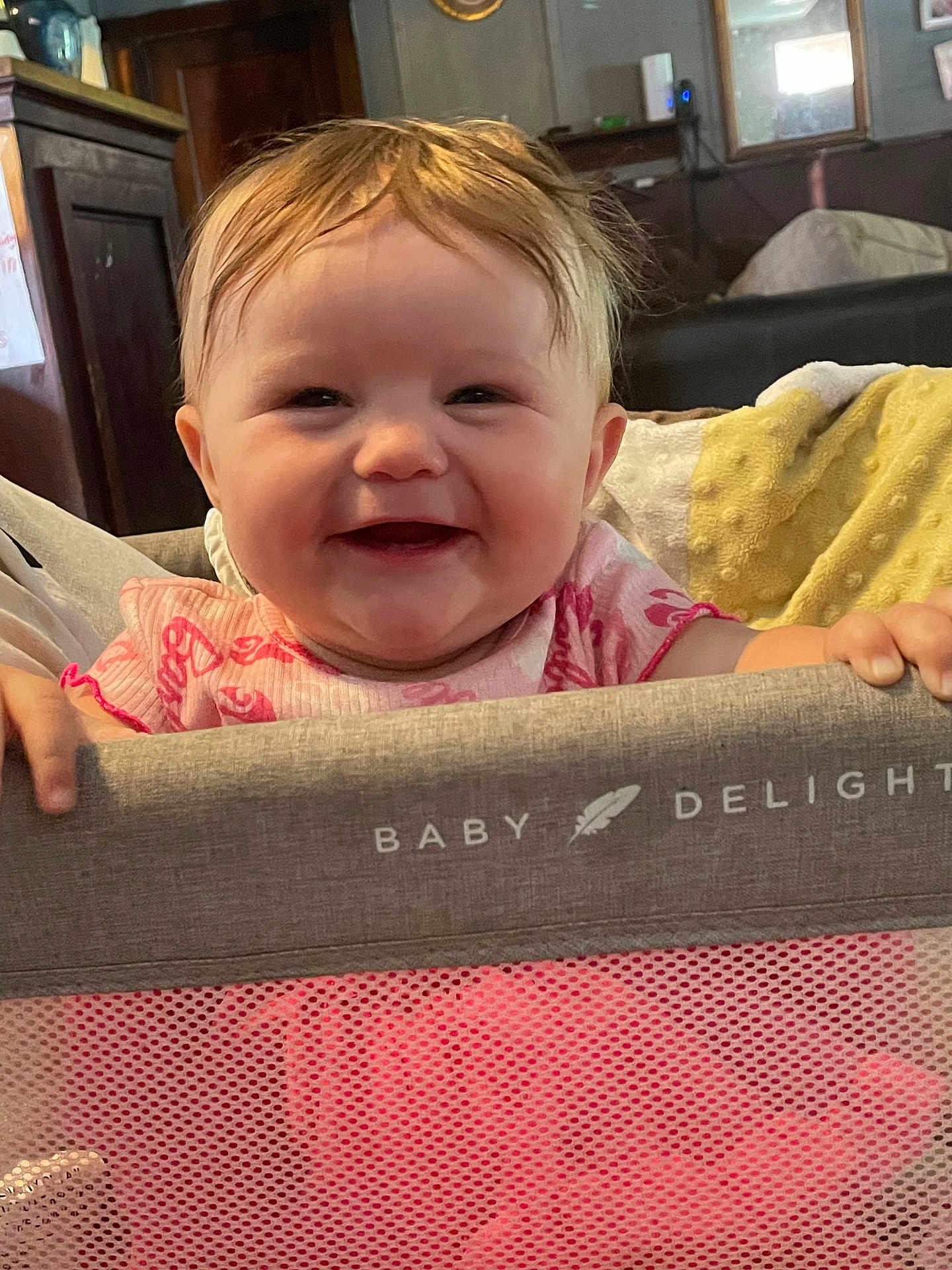 Ellieanna joined the competition — help win amazing prizes! baby, smiling, happy, playpen, indoor, blanket, child, face, person, clothing, pink, hand, home, furniture, mesh, head, hair, infant, cute, joyful