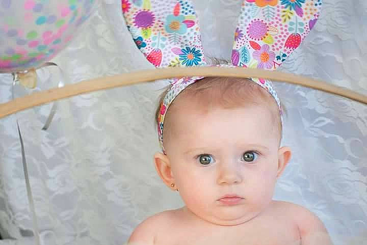 Destiny is registered to the contest to win money with this photo: beauty, cheek, child, ear, eye, face, forehead, fun, girl, hair_accessory, head, headgear, human_hair_color, infant, nose, person, pink, product, skin, smile