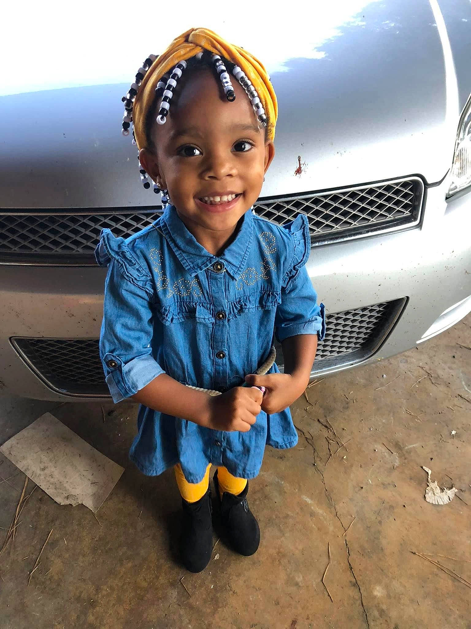 Chloe is registered to the contest to win money with this photo: alloy_wheel, automotive_design, automotive_exterior, automotive_lighting, automotive_tire, automotive_wheel_system, bumper, car, fender, grille, happy, hood, joy, mode_of_transport, motor_vehicle, person, rim, smile, tire, travel