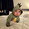 Skylar Scott joined the competition — help win amazing prizes! baby, child, dinosaur_hoodie, hood, costume, crawling, bed, bedding, bedroom, portrait, face, eyes, wide_eyed, indoors, cute, infant, green_clothing, soft_blanket, headboard, home
