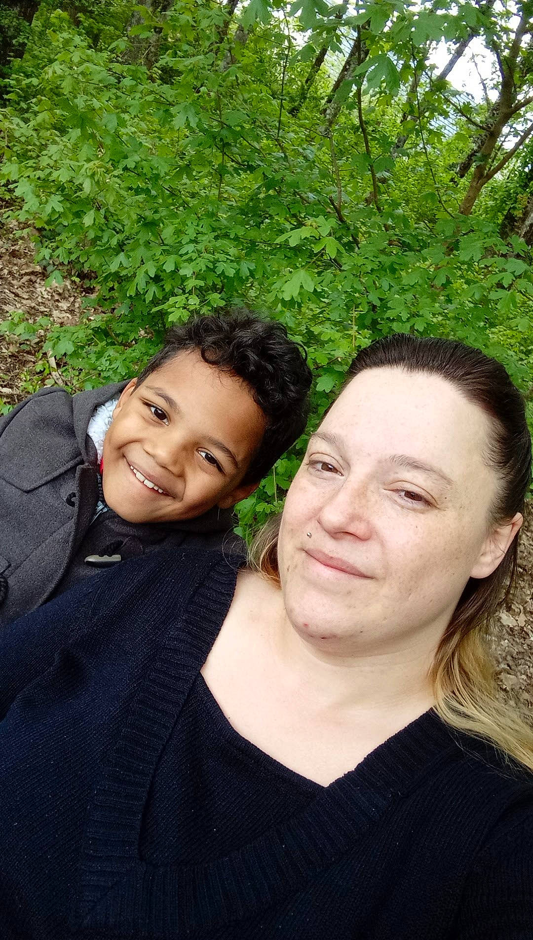 Hayden participe au concours pour gagner de l'argent avec cette photo : child, event, flash_photography, forest, formal_wear, fun, gesture, grass, happy, hug, joy, laugh, leisure, love, people_in_nature, person, plant, portrait_photography, selfie, sitting