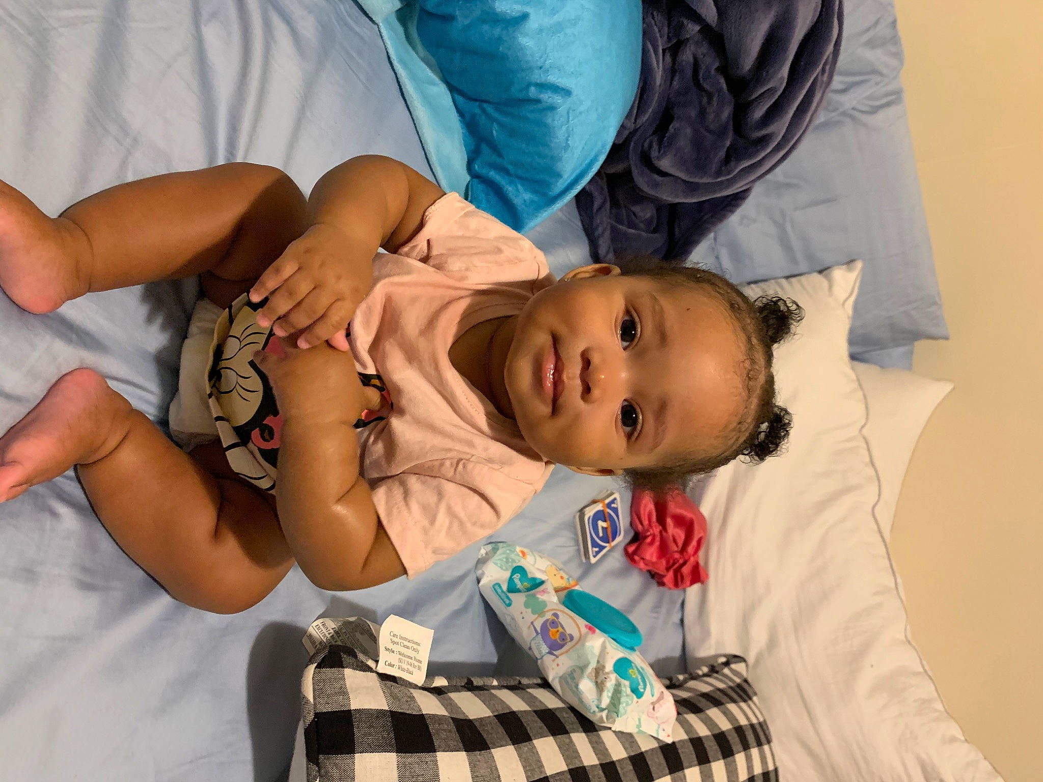 Meílani is registered to the contest to win money with this photo: arm, child, comfort, person