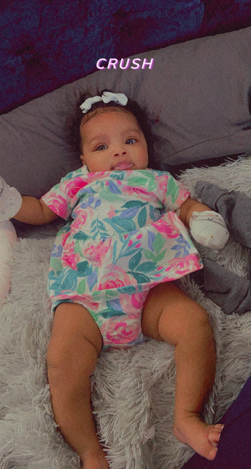 Robyn is registered to the contest to win money with this photo: baby_toddler_clothing, cheek, comfort, eye, face, facial_expression, finger, hairstyle, happy, head, iris, lip, mouth, neck, person, pink, product, shoulder, skin, sleeve