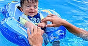Thiago joined the competition — help win amazing prizes! baby, blue, child, cute, floating, fun, hands, happy, infant, inflatable_ring, joy, outdoor, person, playful, safety, smile, splash, summer, swimming_pool, water