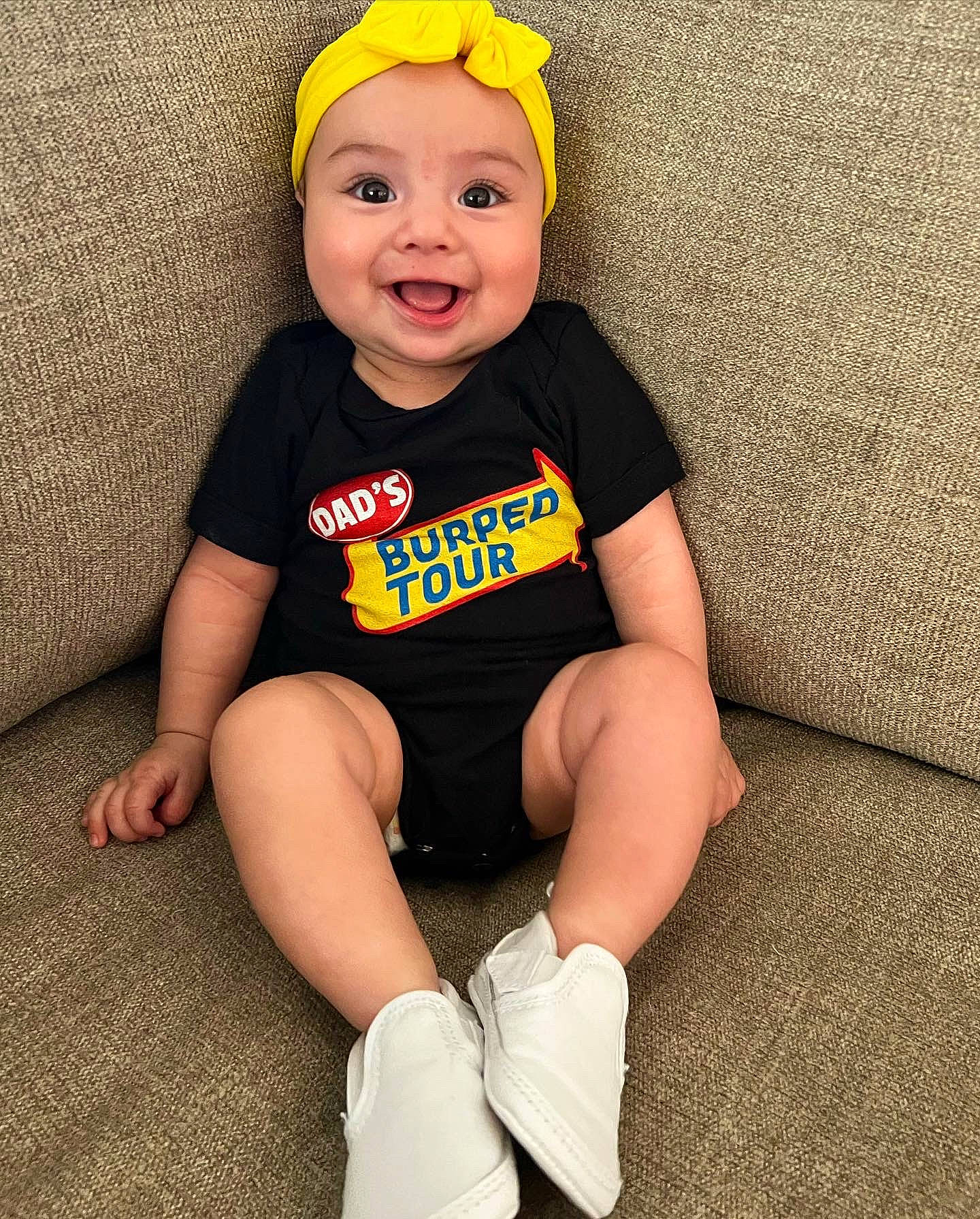 Camilla joined the competition — help win amazing prizes! baby, baby_toddler_clothing, cap, child, costume_hat, face, flooring, foot, fun, happy, head, headwear, human_leg, joy, knee, person, sleeve, smile, sock, sportswear