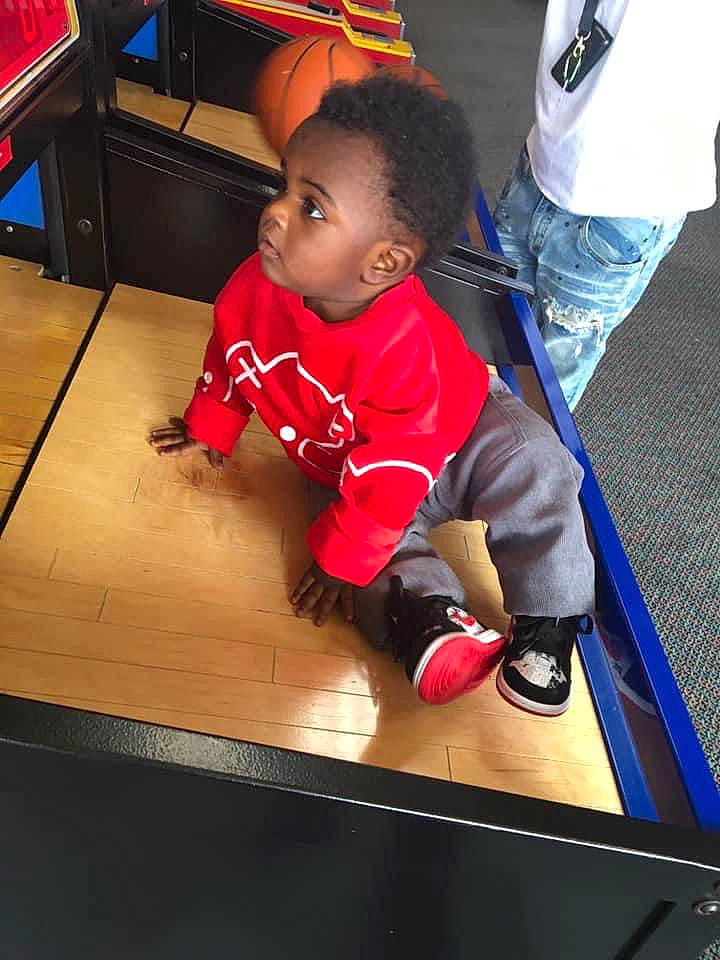 Daveon joined the competition — help win amazing prizes! baby, baby_toddler_clothing, carmine, child, floor, flooring, foot, laminate_flooring, long_sleeved_t_shirt, outdoor_shoe, person, play, shoe, sneakers, sock, toddler, varnish, walking_shoe, wood_flooring