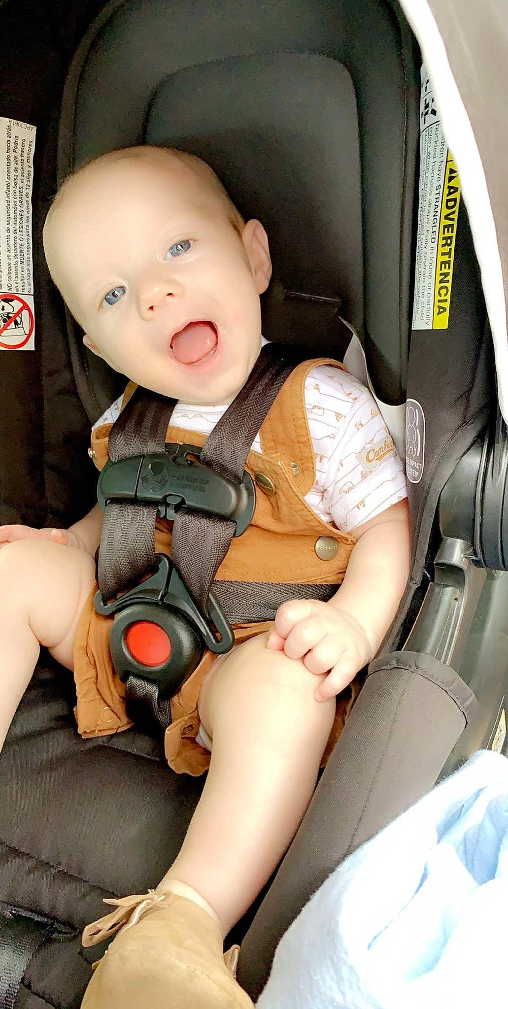 Anderson is registered to the contest to win money with this photo: auto_part, baby, baby_carriage, baby_in_car_seat, baby_products, car_seat, car_seat_cover, child, person, product, seat_belt, surprise, toddler
