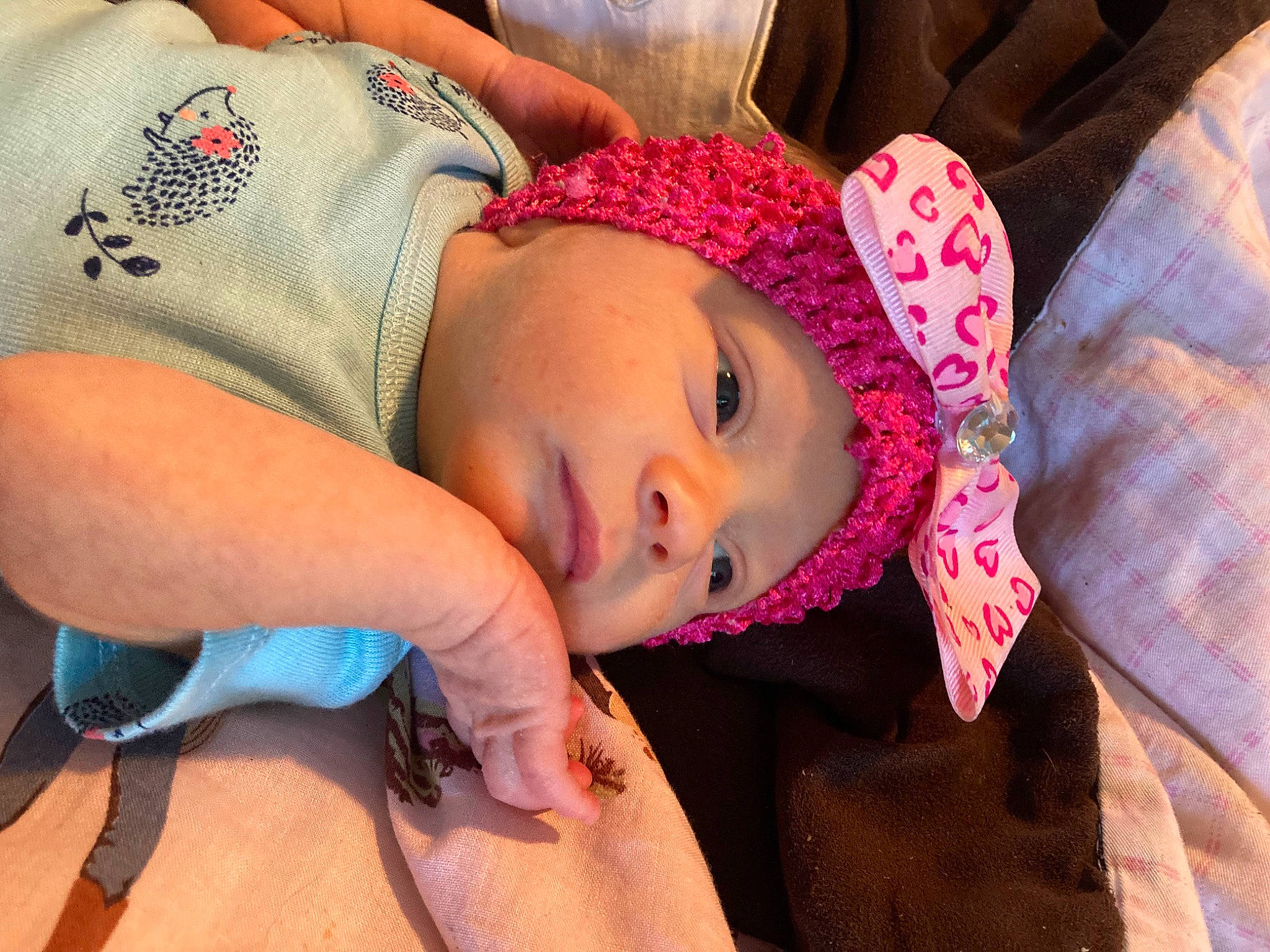 Alivia joined the competition — help win amazing prizes! abdomen, baby, bedtime, child, comfort, elbow, eye, eyelash, fashion_accessory, happy, headwear, lip, magenta, mouth, neck, nose, pattern, person, skin, textile