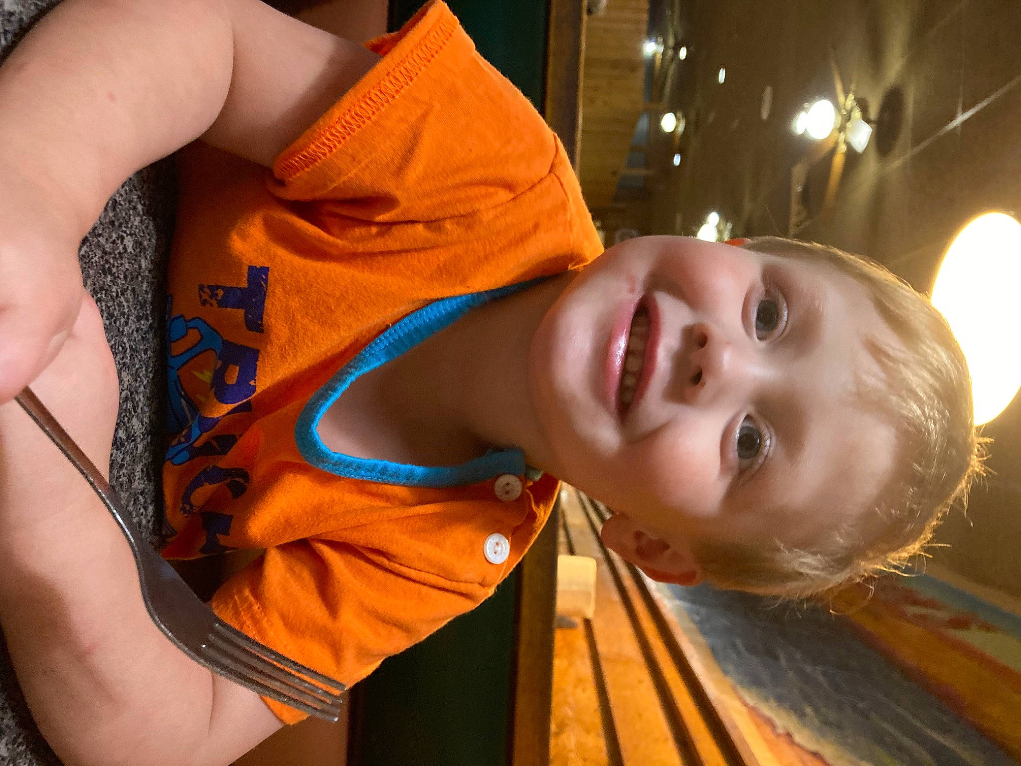 Jeffery is registered to the contest to win money with this photo: chest, child, chin, elbow, electric_blue, flash_photography, fun, happy, human, joy, leisure, mouth, neck, nose, orange, organ, people, person, smile, toddler