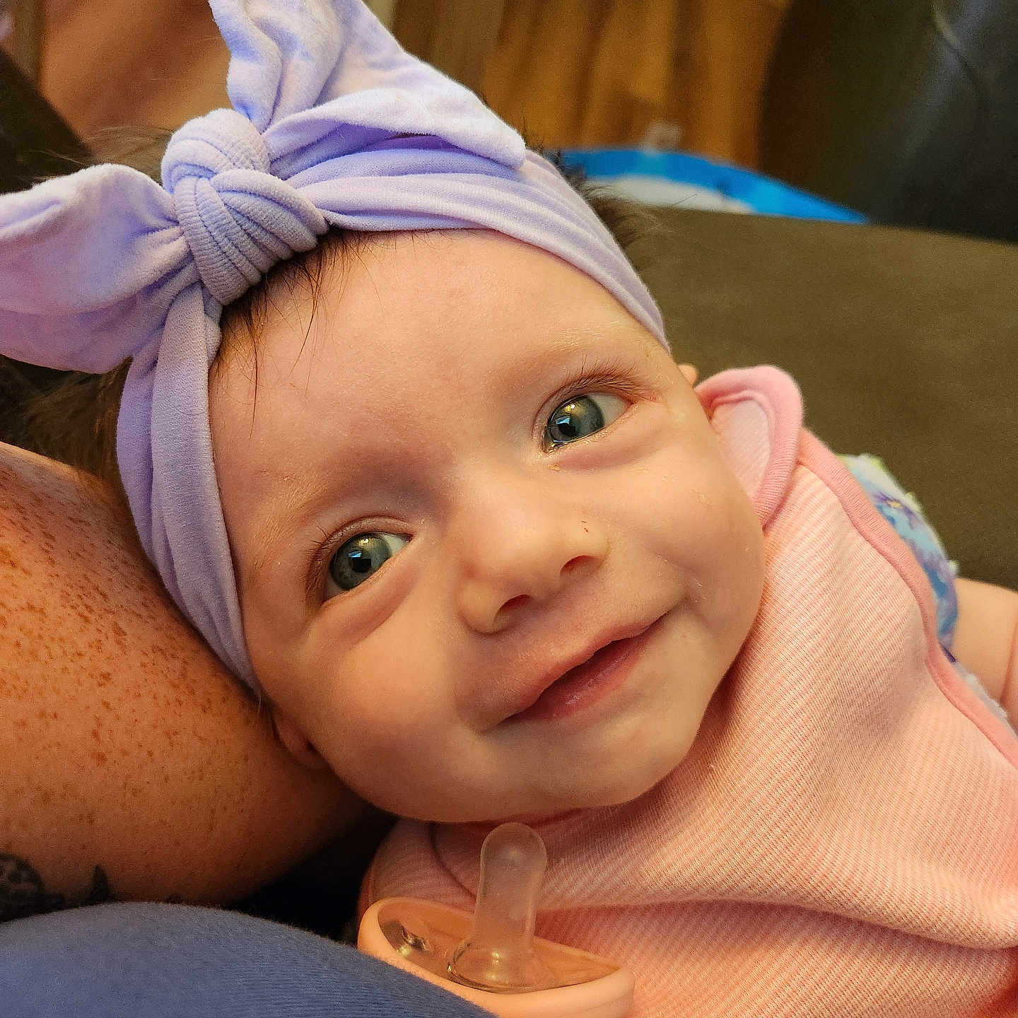 Emberly joined the competition — help win amazing prizes! accessories, baby, bodypart, bonnet, clothing, couch, face, finger, furniture, hand, happy, hat, head, headband, newborn, person, photography, portrait, smile, towel