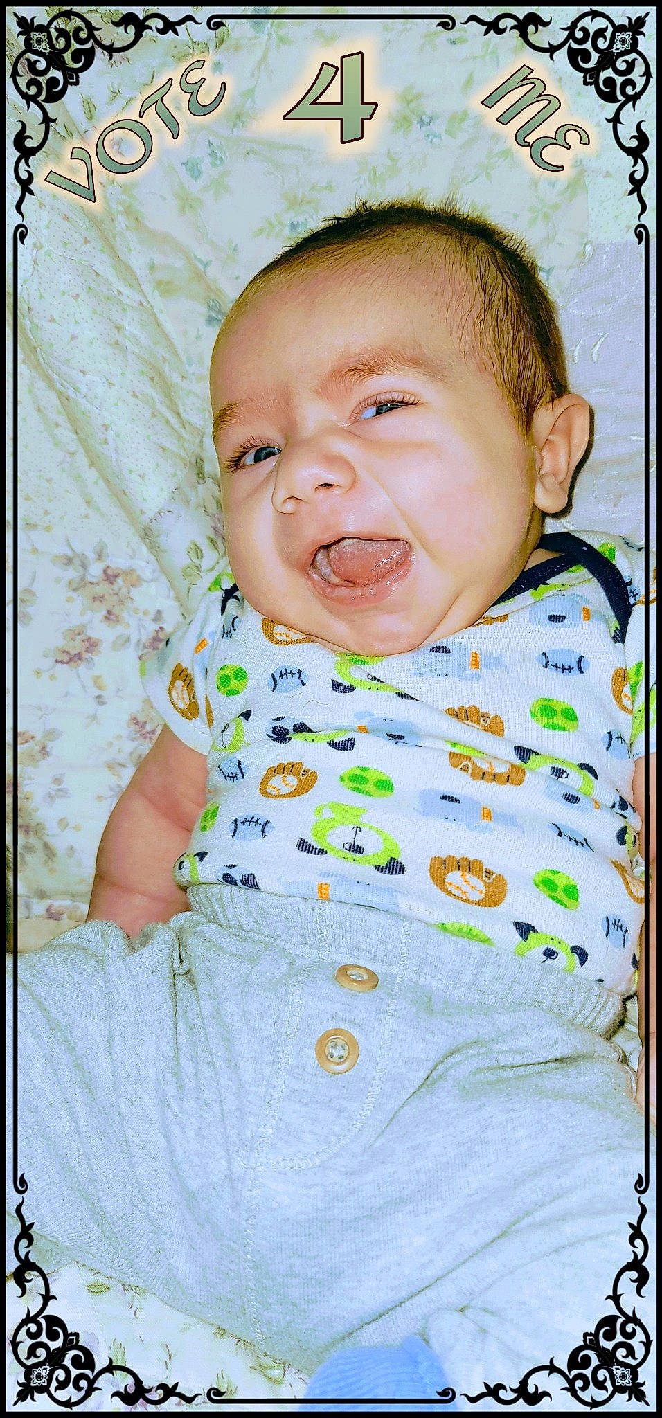 Xander joined the competition — help win amazing prizes! baby, baby_toddler_clothing, cheek, child, clothing, collar, comfort, happy, head, iris, linens, pattern, person, pink, portrait_photography, sitting, sleeve, t_shirt, toddler