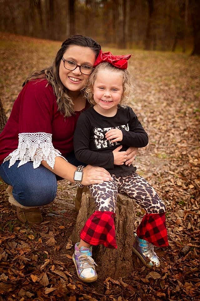 Avagrace is registered to the contest to win money with this photo: child, event, eye, face, flash_photography, fun, glasses, grass, happy, head, joy, leaf, leisure, people, people_in_nature, person, photograph, red, sitting, smile