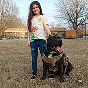 Udk Toro joined the competition — help win amazing prizes! child, girl, dog, pet, large_dog, harness, leash, grass, backyard, house, trees, sky, tshirt, jeans, sneakers, smile, tongue_out, happy, portrait, daylight