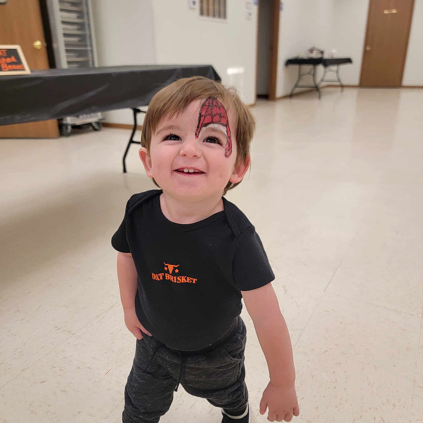 Levi is registered to the contest to win money with this photo: bodypart, boy, child, clothing, face, finger, footwear, hand, hardwood, head, jeans, male, pants, person, photography, portrait, shoe, shorts, t_shirt, wood