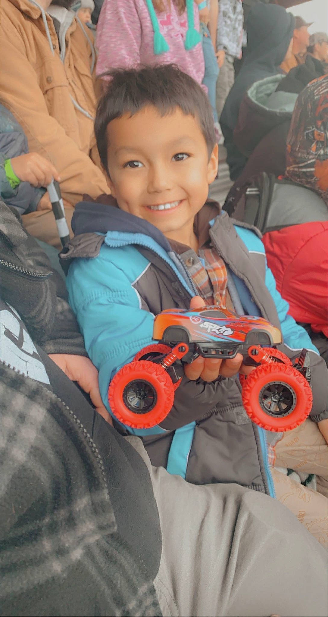 Giovanni joined the competition — help win amazing prizes! baby, baby_carriage, baby_products, child, fun, hand, happy, human, joy, leisure, organ, outerwear, person, personal_protective_equipment, recreation, sitting, skin, smile, snapshot, toddler