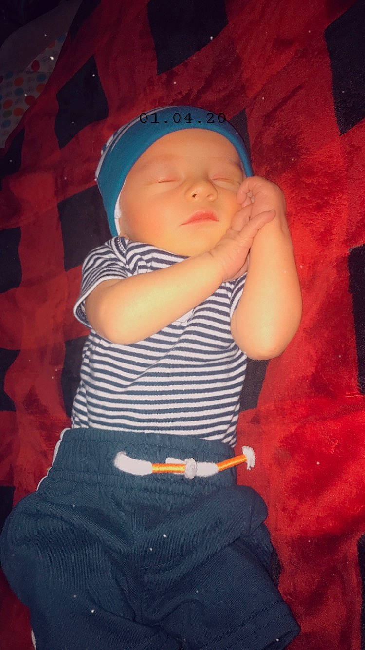 Malikai is registered to the contest to win money with this photo: abdomen, arm, cheek, child, headwear, person, toddler, trunk