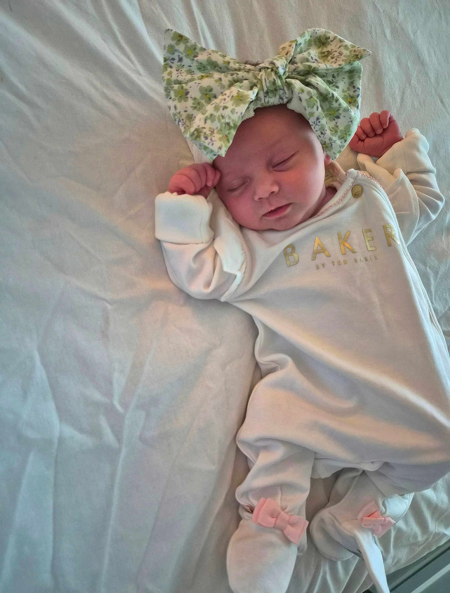 Matilda joined the competition — help win amazing prizes! baby, sleeping, infant, headband, bow, white_outfit, pink_bows, bed, blanket, cozy, cute, peaceful, soft_lighting, newborn, portrait, child, person, indoor, relaxation, sleep